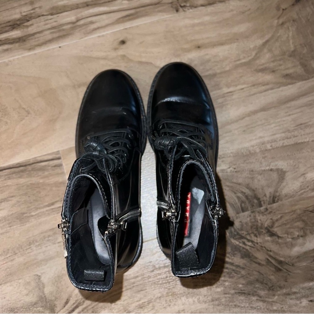 Prada women’s Glossy Black Boots